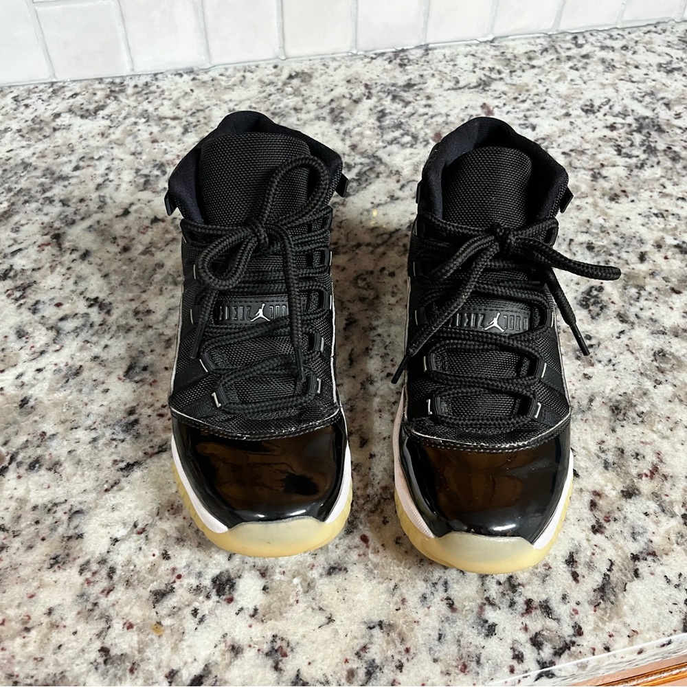 Jordan 11 25th Anniversary Jubilee Athletic Shoes Black and Cream